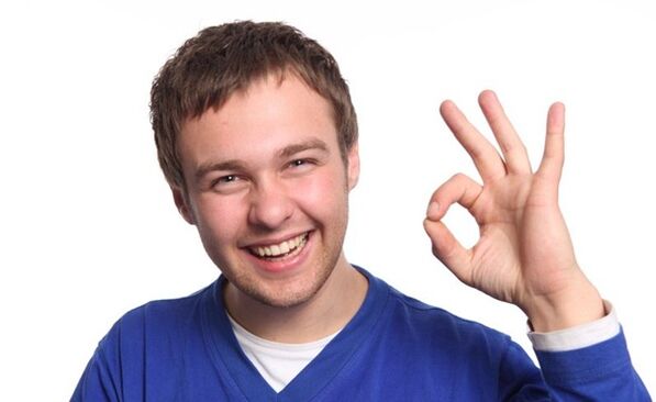 the man is pleased with the enlargement of the penis with a vacuum extender